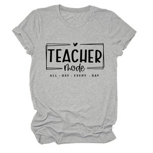 Close-up of Teacher Mode print on grey short sleeve t-shirt with heart graphic