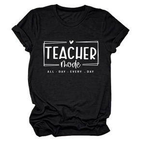 Detail of the knit texture and printed teacher mode graphic on a black crewneck shirt