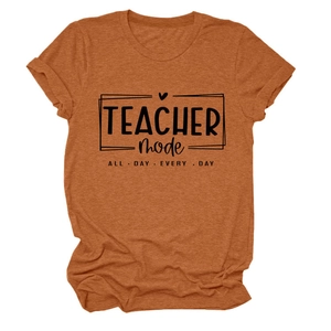 Detail of rust red t-shirt fabric texture and TEACHER mode printed text