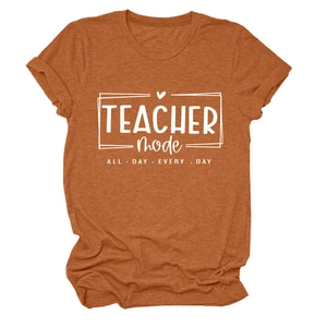 Close-up of rolled sleeve detail and white teacher mode print on orange heather t-shirt