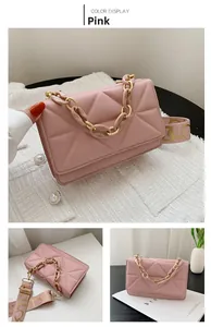 Pink quilted shoulder bag with triangle patterns and mixed resin-metal chain detail