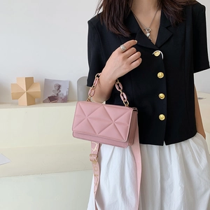 Pink quilted chain crossbody bag for women with wide branded textile strap and flap closure