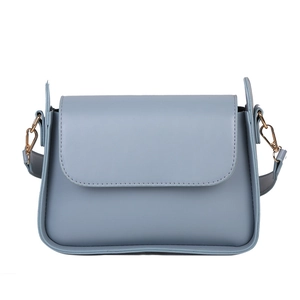 Vintage light blue baguette bag for women with minimalist flap design and gold hardware