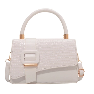 White minimalist crossbody bag with crocodile pattern flap and gold hardware accents