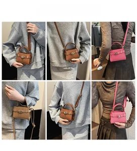 Detailed views of mini litchi pattern handbags with golden buckle and adjustable strap