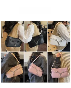 Detailed views of leather baguette bags with metal chains and heart charms in five colors
