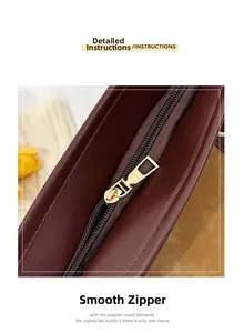Detail of premium gold metal zipper and stitching on the vintage tote bag