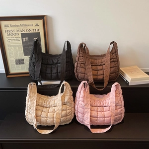 Quilted nylon hobo bags in black brown beige and pink colors with adjustable straps