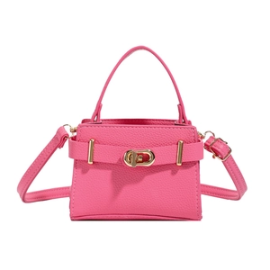 Pink lychee grain leather mini bag with gold-tone hardware and top handle strap