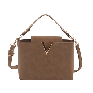 Brown faux leather bucket bag with gold V hardware and adjustable shoulder strap