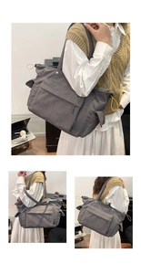 Dettaglio borsa tote in velluto a coste grigio scuro con ampia capacità e coulisse