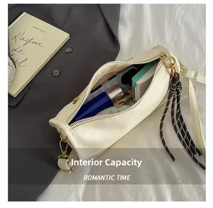 Detail showing the internal capacity of the cream-white cylindrical tote bag for cosmetics