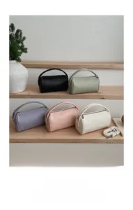 Minimalistische zylindrische Handtaschen mit Lychee-Muster und abnehmbaren Trageriemen