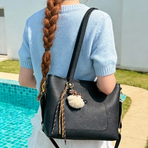 Black large capacity tote bag with litchi grain leather and cute sheep pendant on shoulder
