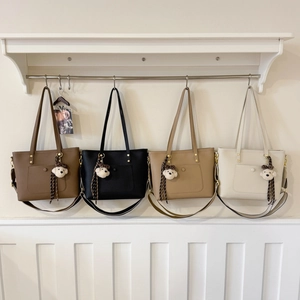 Minimalist large tote bags in four colors with striped straps and bear charm