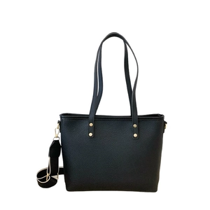 Black pebbled tote bag with golden studs and a trendy striped wide shoulder strap
