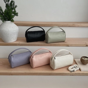 Minimalist litchi texture cylinder handbags in five colors with adjustable straps