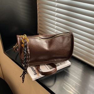 Women PU Leather Shoulder Crossbody Bag With Tennis Racket Charm Braided Tassel Retro Half Moon Pillow Shape Fashion