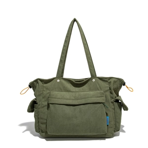 Borsa tote in velluto a coste verde con tasca frontale e lacci regolabili