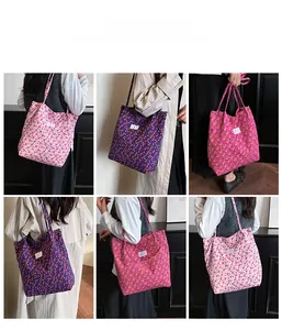 Detail showing floral quilted tote bag with side snap buttons and diverse patterns