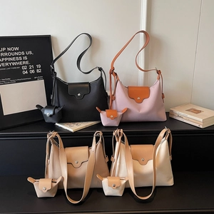Minimalist canvas shoulder bag set in black, lilac, khaki, and cream white colors