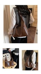 Close-up of matte dark brown PU leather tote bag with decorative black and white lacing