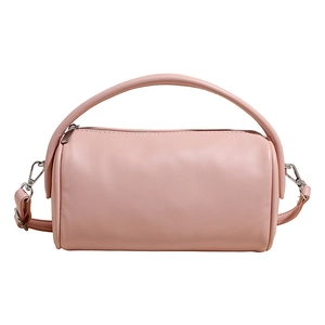 Pink lychee texture cylindrical handbag with adjustable strap and silver hardware