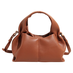 Caramel cloud handbag in pleated leather with adjustable strap for a French chic look