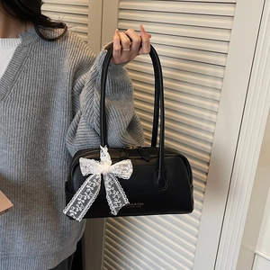 Elegant black Boston handbag with white lace bow and gold lettering for women