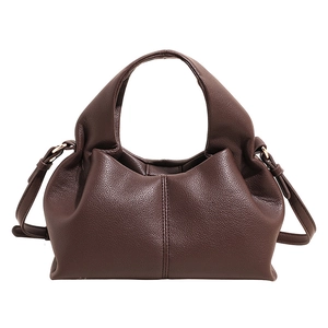 Deep brown lychee pattern leather dumpling bag with versatile shoulder strap and handles