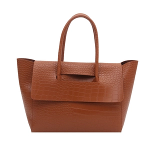 Caramel brown crocodile embossed tote bag with large flap and dual handles