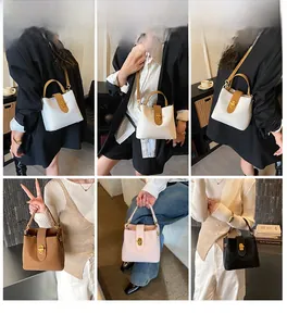 Litchi texture bucket bags in various colors with golden twist locks shown on model