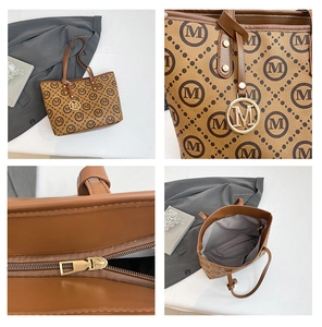 Détails du sac cabas classique avec imprimé, pendentif en métal M et fermeture
