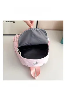 Internal view of a cute cartoon pink backpack showing its spacious main compartment