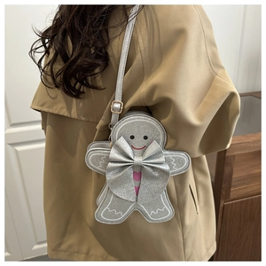 Sac bandoulière bonhomme pain d'épices pailleté argenté avec détail de nœud