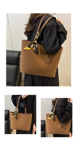 Detail of large leopard print tote bag with stylish vintage floral scarf on the handle