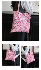 Detailed views of floral print shoulder tote bag with textured fabric and logo label