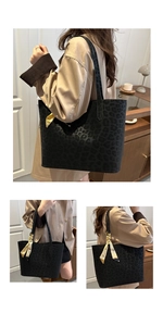 Detail of a large black leopard print tote bag with a decorative floral silk scarf handle