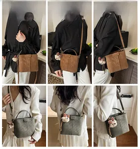 Retro bucket bag worn by model showing side and back views in brown and green