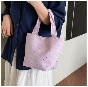 Detail of lavender star print tote bag showing the fabric texture and sequins