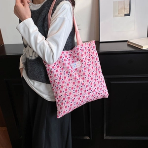 Pink bubble texture tote bag with colorful polka dots and stylish shoulder strap