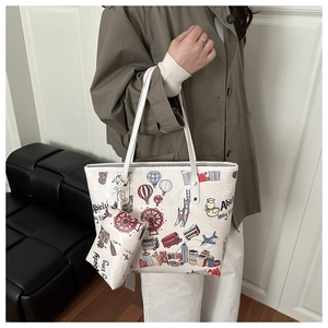 Detailed side view of cartoon print white tote bag set with matching small hanging pouch
