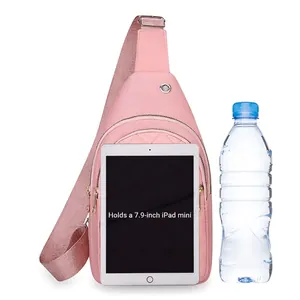 Pink quilted crossbody sling bag with large capacity for 7.9-inch tablet and water bottle