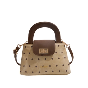 Retro canvas crossbody bag with polka dot pattern and brown leather trim details