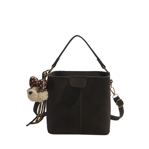 Retro charcoal leather bucket bag with plush puppy pendant and adjustable strap