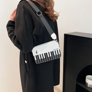 Chic piano keyboard crossbody bag with I Love Music print and wide shoulder strap