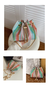 Macro detail of rainbow woven texture with pearl drawstring and gold metal chain strap