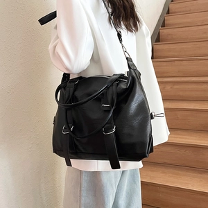 Women's black large PU leather tote bag with silver hardware for commute and leisure