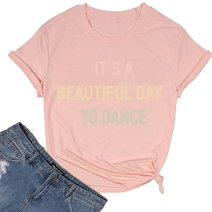 Close-up of pink crew neck T-shirt with rolled sleeves and front knot detail