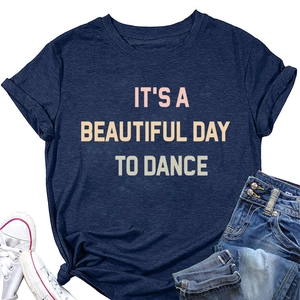 Close-up of Navy Blue T-shirt featuring pink IT'S A BEAUTIFUL DAY printed slogan